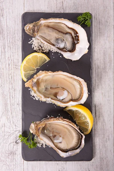 oyster with lemon, top view