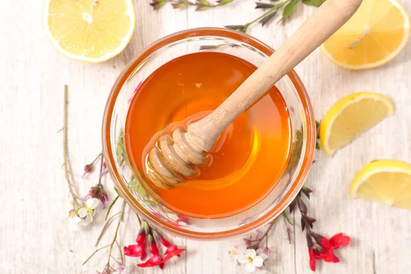 Schaal Van Honing Met Citroen Bloemen — Stockfoto