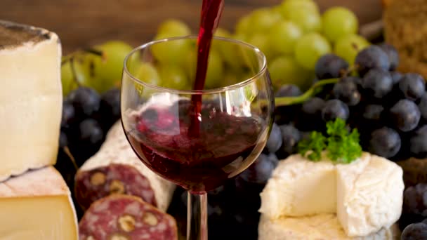 Glass Red Wine Salami Cheese Grapes — Stock Video