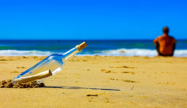 Message Bottle Sand Alone Man Looking Sea View — Stock Photo, Image