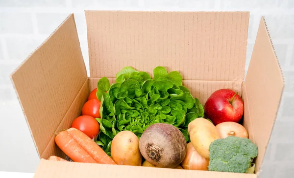 Vegetables box, delivery box. Fresh fruits and vegetables .