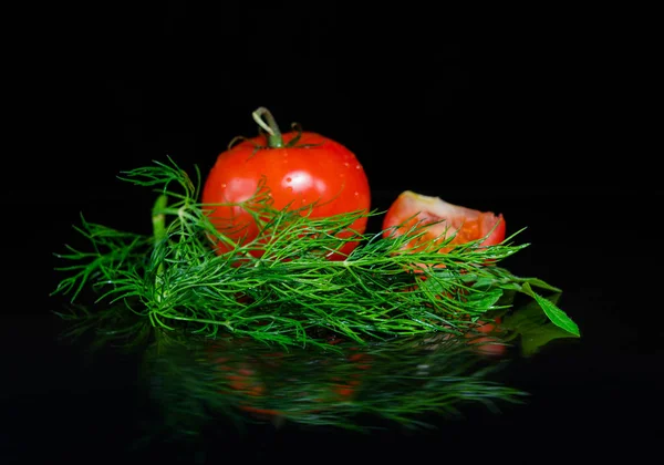 Fresh tomato on black background — Stock Photo, Image