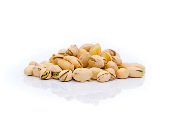 Pistachios on a white background . Pistachio nuts — Stock Photo, Image