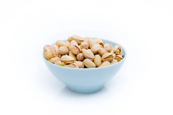 Pistachios in  bowls. Roasted pistachio seeds — Stock Photo, Image