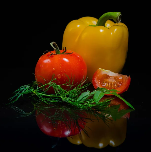 Fresh tomato on black background — Stock Photo, Image