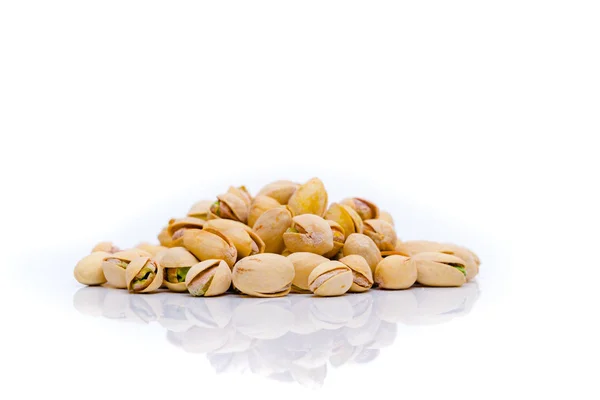 Pistachios on a white background . Pistachio nuts — Stock Photo, Image