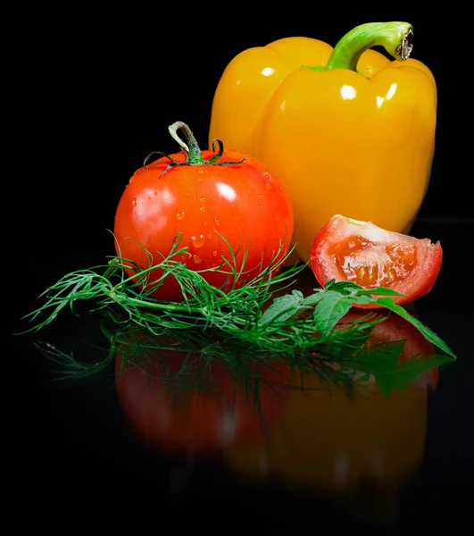 Fresh tomato on black background — Stock Photo, Image