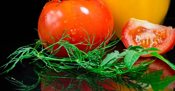 Fresh tomato on black background — Stock Photo, Image