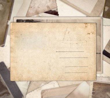 Yığın üzerinde Vintage Kartpostal arka plan eski fotoğraf sayısı