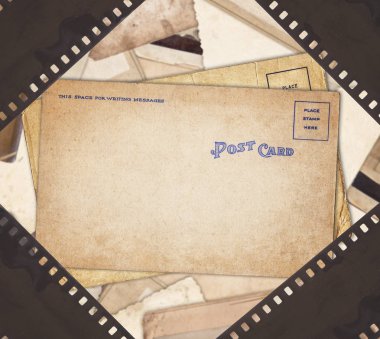 Yaşlı retro kartpostal ve eski film şeridi ile antika arka plan