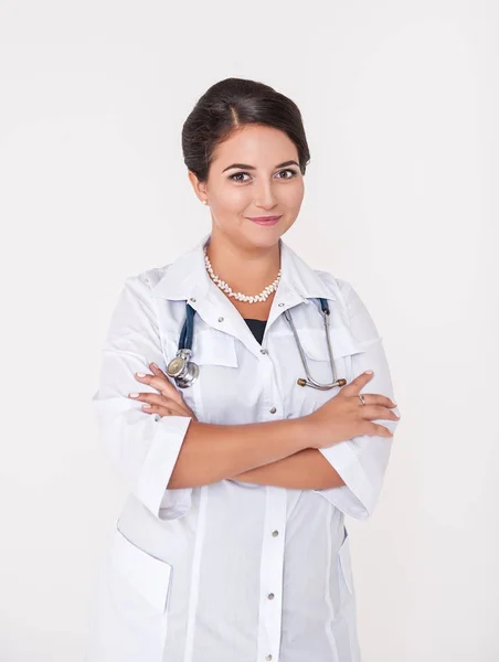 Beautiful happy woman doctor smiling on white — Stock Photo, Image