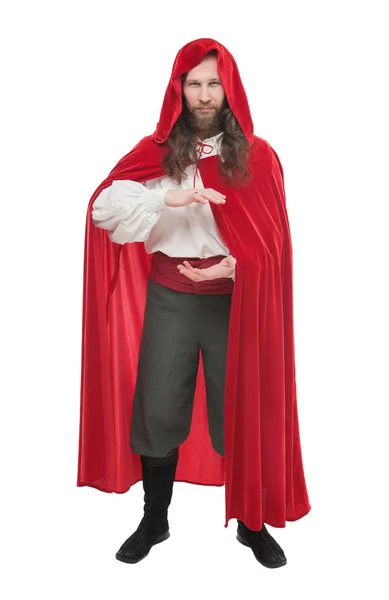Pohledný muž v historických pirát kostým a plášť držení některé — Stock fotografie