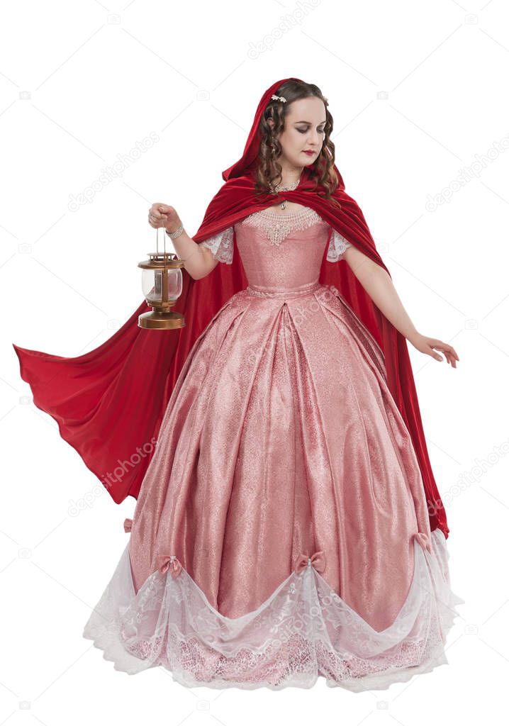 Beautiful woman in old historic medieval dress with lantern isol