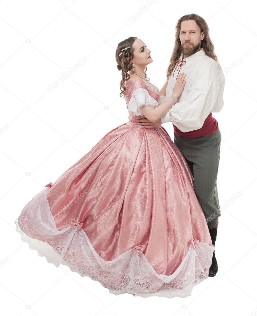 Beautiful couple woman and man in medieval clothes isolated 