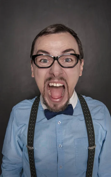 Funny Angry screaming teacher man on blackboard — Stock Photo, Image