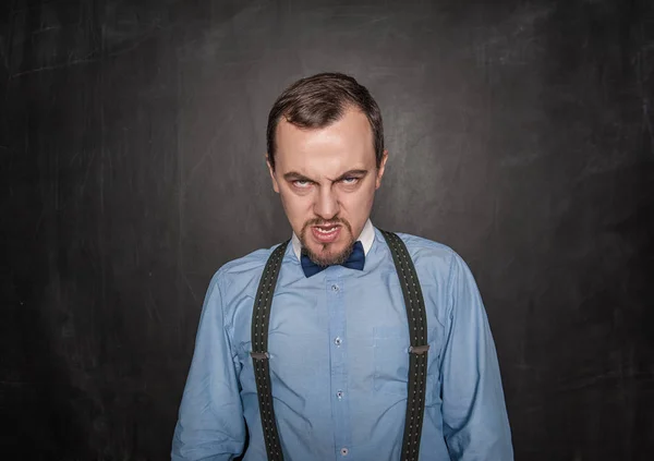 Angry Business man of leraar op Blackboard — Stockfoto