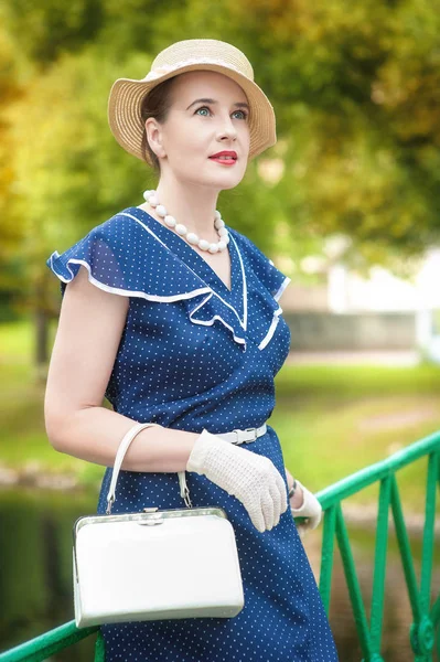 Beautiful woman retro style in blue dress — Stock Photo, Image