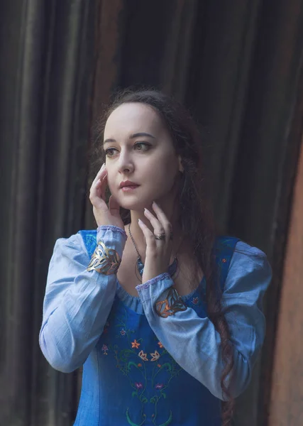 Portrait of beautiful woman in blue medieval dress — Stock Photo, Image