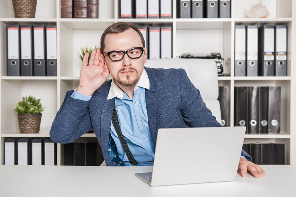 Handsome business man overhear in office