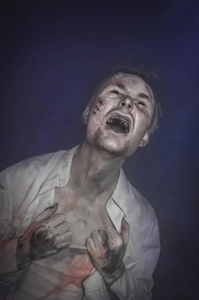 Horror terrible zombie man screaming. Halloween scene — Stock Photo, Image