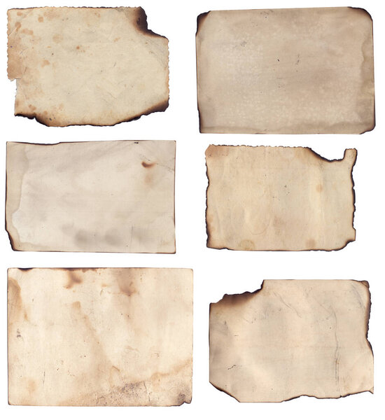 Bunch of Old vintage rough texture retro paper with burned edges, stains and scratches background 