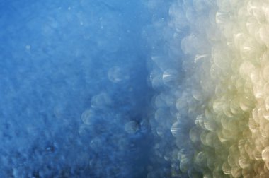 Soyut bulanık ışıltılı ışıltılı arka planda parıltılı ışık