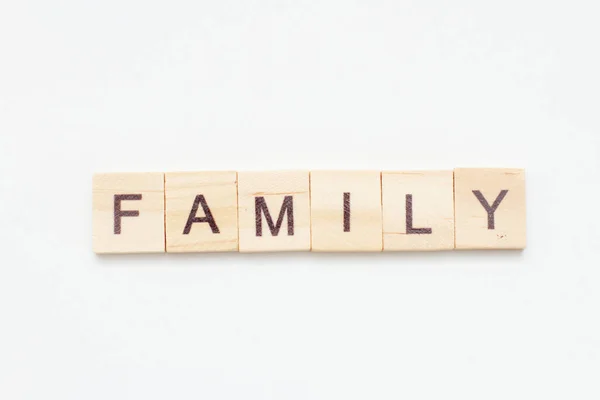 Inscription FAMILY made of letters on wooden blocks. — Stock Photo, Image