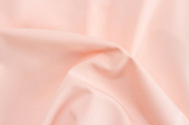 Arkaplan için pembe renkli ipek kumaşın dokusu.