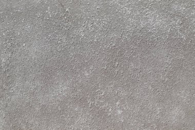 Alçı desenli gri beton duvar dokusu.