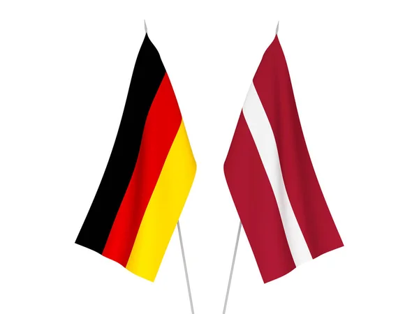 Almanya ve Letonya bayrakları — Stok fotoğraf