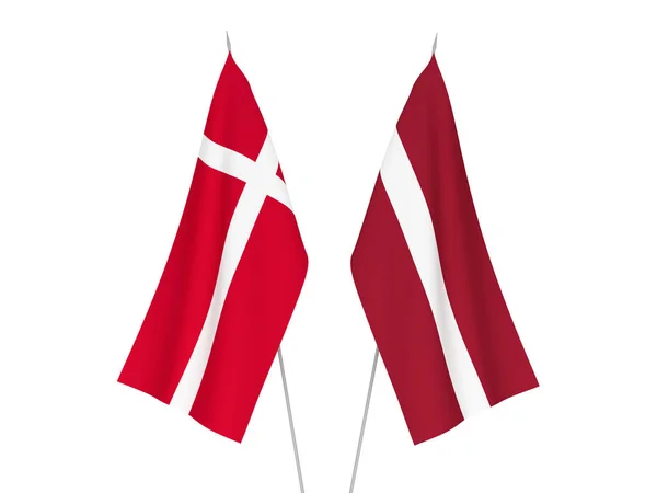 Lettland och Danmark flaggor — Stockfoto