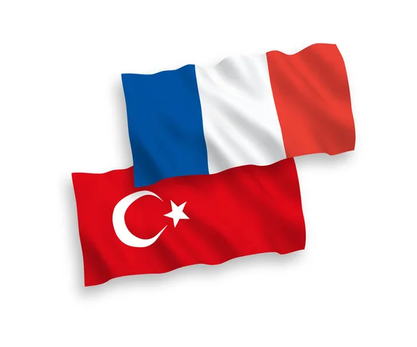 Drapeaux de la Turquie et de la France sur fond blanc — Image vectorielle