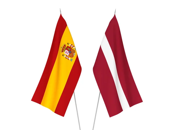Lettország és Spanyolország zászlók — Stock Fotó