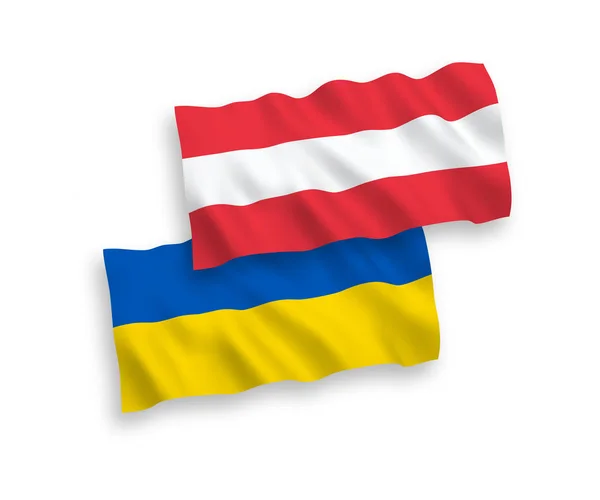 Прапори Австрії та України на білому фоні — стоковий вектор