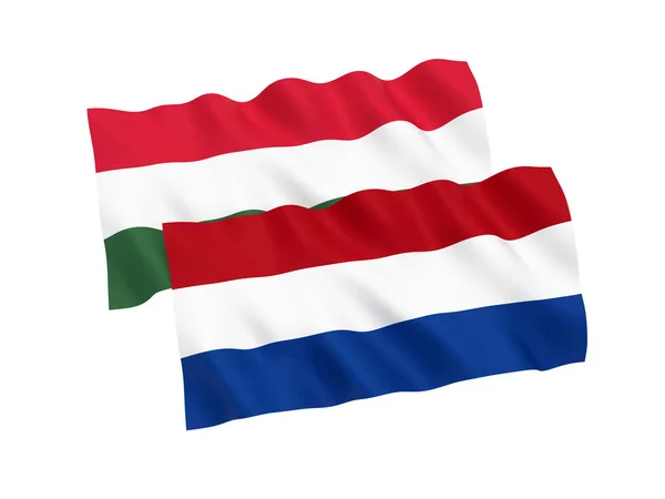 Bandeiras da Hungria e Países Baixos sobre um fundo branco — Fotografia de Stock
