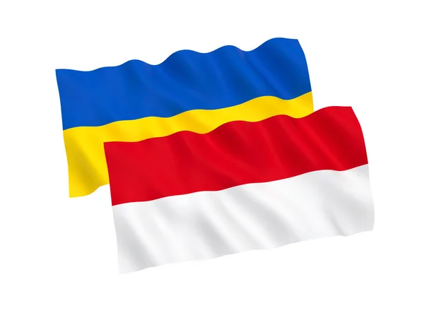 白い背景にウクライナとインドネシアの旗 — ストック写真
