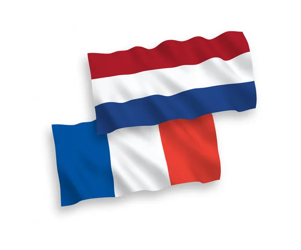 Bandiere di Francia e Paesi Bassi su sfondo bianco — Vettoriale Stock