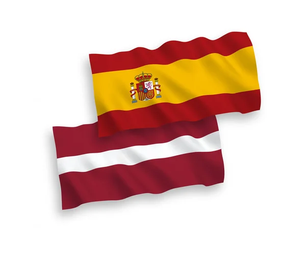 Banderas de Letonia y España sobre fondo blanco — Archivo Imágenes Vectoriales