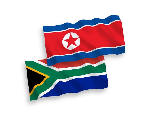 Flags of North Korea and Republic of South Africa on a white background — Stock Vector