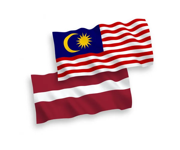 Bendera Latvia dan Malaysia dengan latar belakang putih - Stok Vektor
