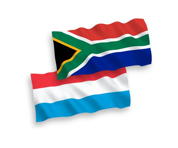 Banderas de la República de Sudáfrica y Luxemburgo sobre fondo blanco — Vector de stock