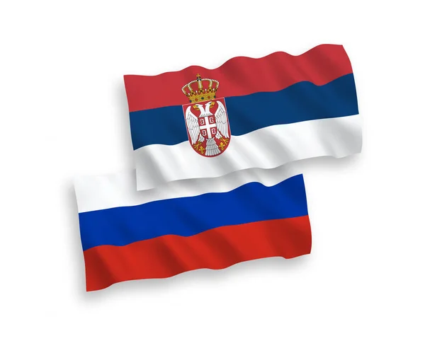 Bandeiras da Sérvia e da Rússia sobre um fundo branco — Vetor de Stock