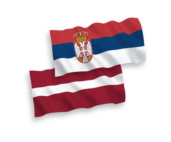 白色背景上的拉脱维亚和塞尔维亚国旗 — 图库矢量图片