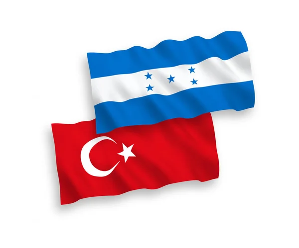 Drapeaux de la Turquie et du Honduras sur fond blanc — Image vectorielle