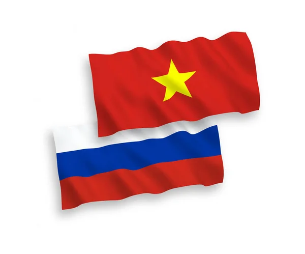 Vlajky Vietnamu a Ruska na bílém pozadí — Stockový vektor