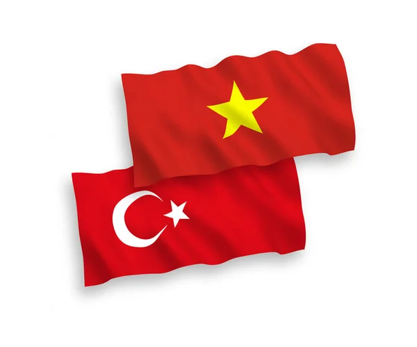Flags of Turkey and Vietnam on a white background — Stock Vector
