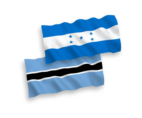博茨瓦纳和洪都拉斯在白色背景下孤立的国家病媒织物波浪旗 1比2的比例 — 图库矢量图片