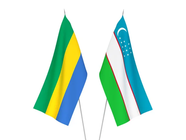 Bandeiras Tecido Nacional Uzbequistão Gabão Isoladas Fundo Branco Ilustração Renderização — Fotografia de Stock
