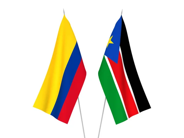 Flaggorna i Colombia och Sydsudan — Stockfoto