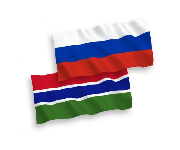Flagi Republiki Gambii i Rosji na białym tle — Wektor stockowy